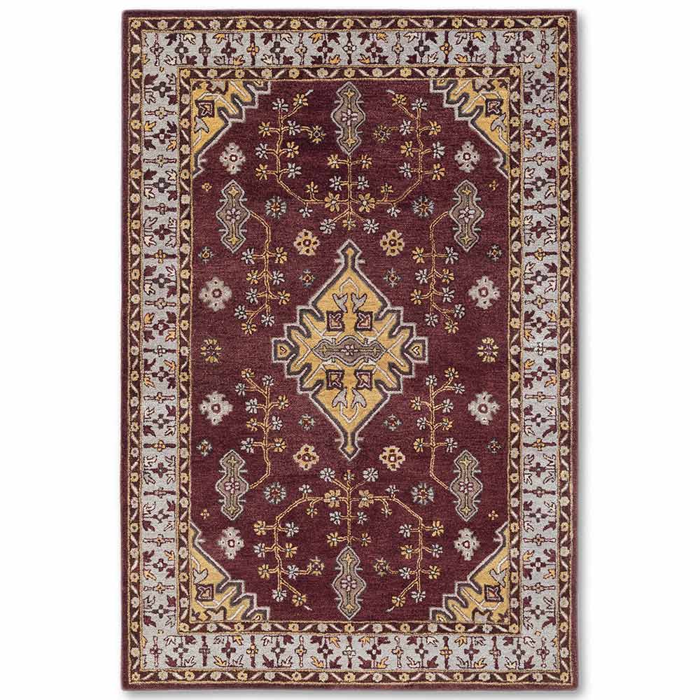 Decorative rug with intricate patterns on a white background