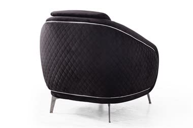 Black quilted armchair on a white background