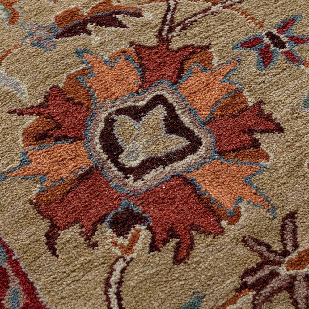 Close-up of a textured rug with autumn leaf pattern