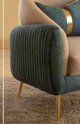 Green upholstered chair with gold legs on a brown carpet