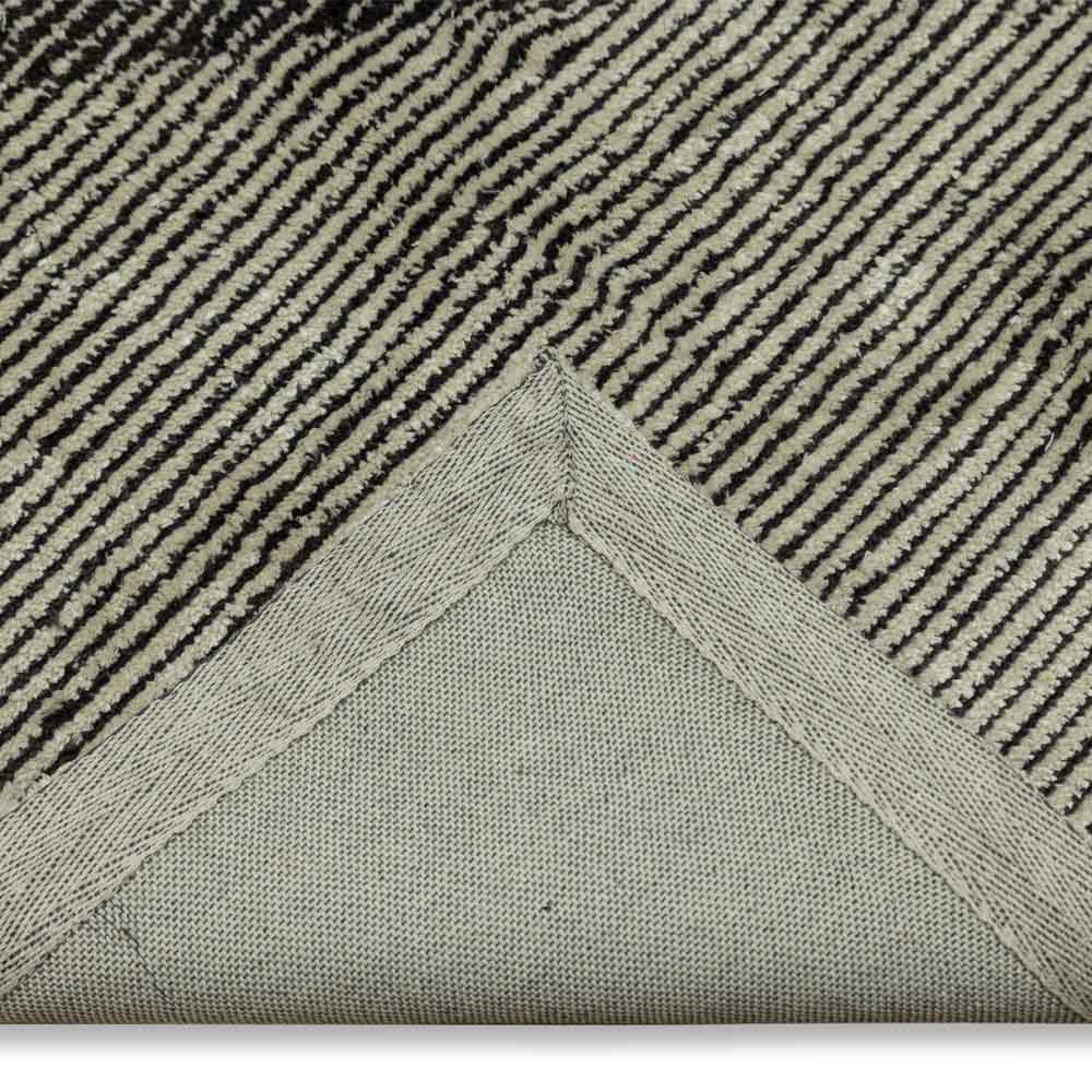 Close-up of a textured rug with geometric pattern