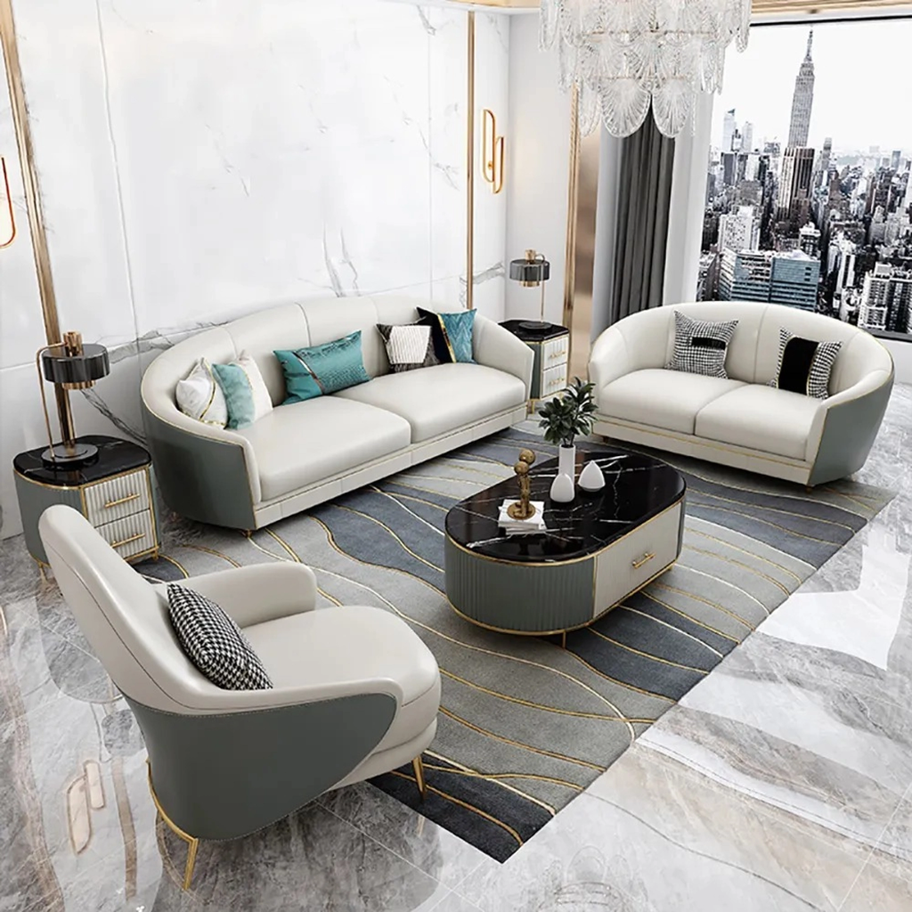Modern living room with white sofa, armchair, and coffee table in a stylish interior.