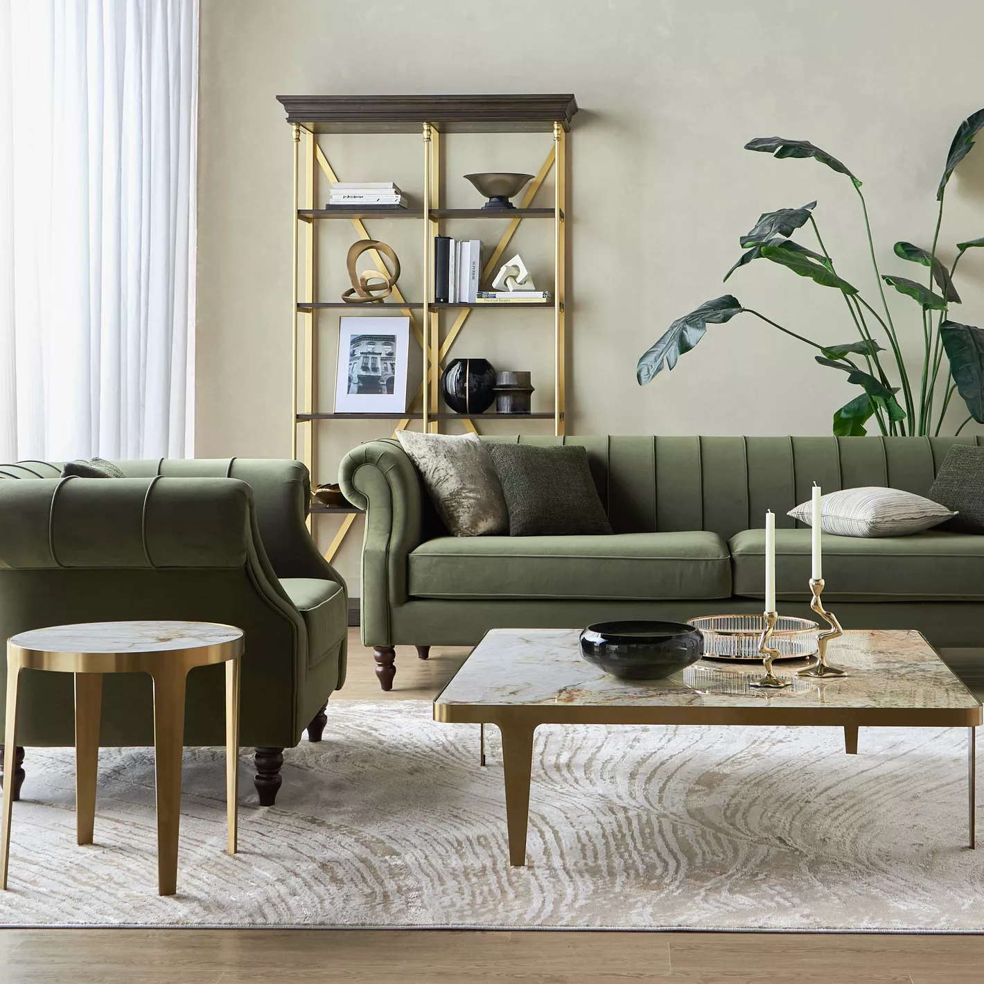 Modern living room with green sofa, bookshelf, and decorative items.