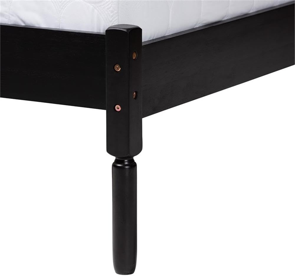 Black metal bed frame with visible screws on a white background