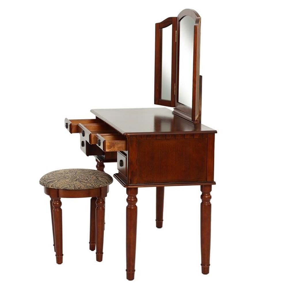 Wooden vanity table with mirror and stool on a white background