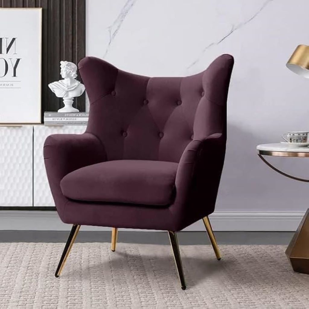Purple armchair in a room with decorative elements