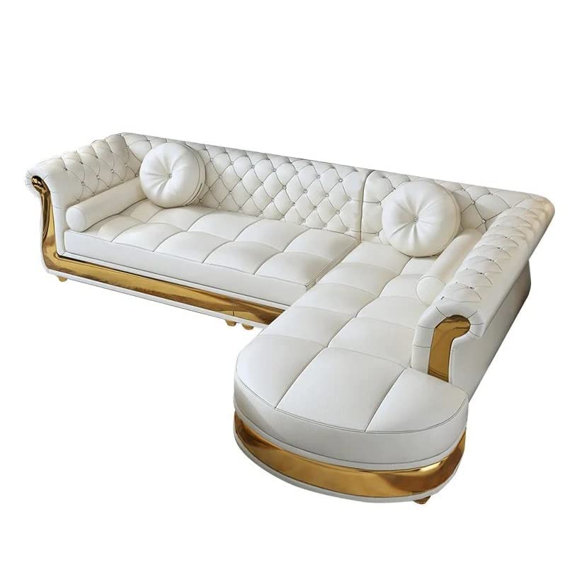 White tufted sofa with gold accents on a white background