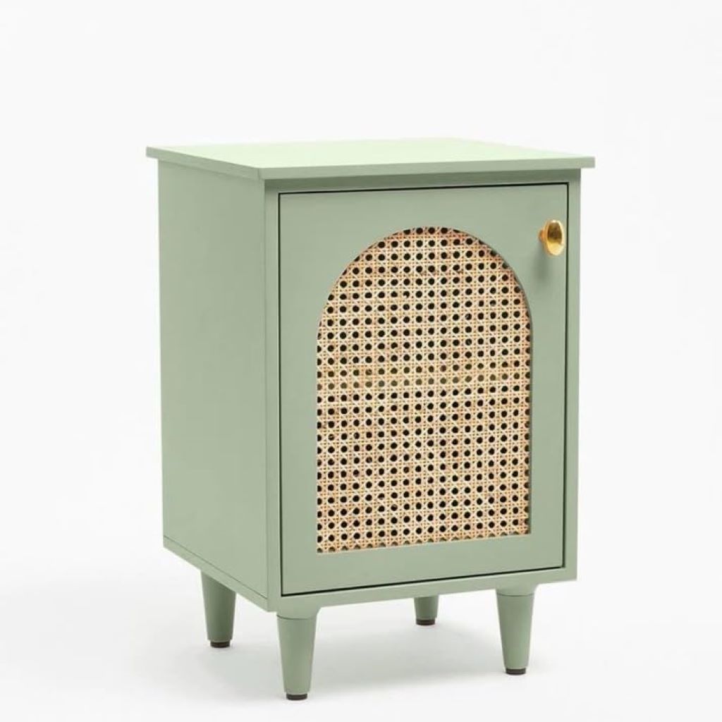 Green cabinet with wicker door on a white background