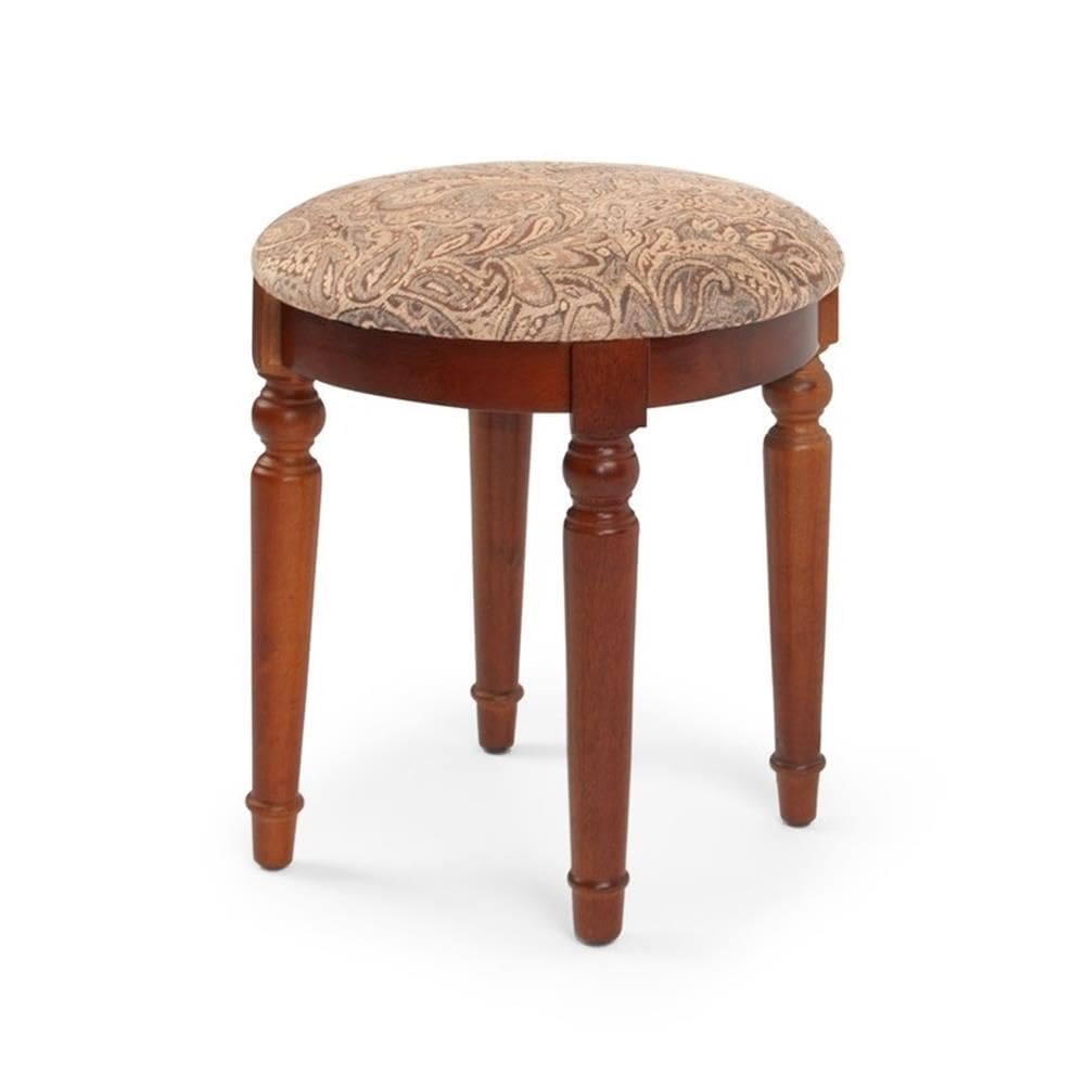 Wooden stool with patterned cushion on a white background
