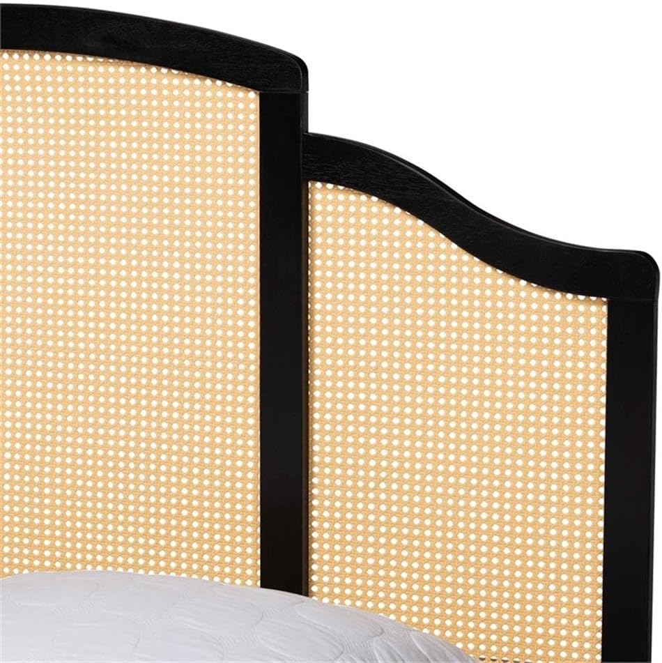 Wicker headboard with black frame on a white background