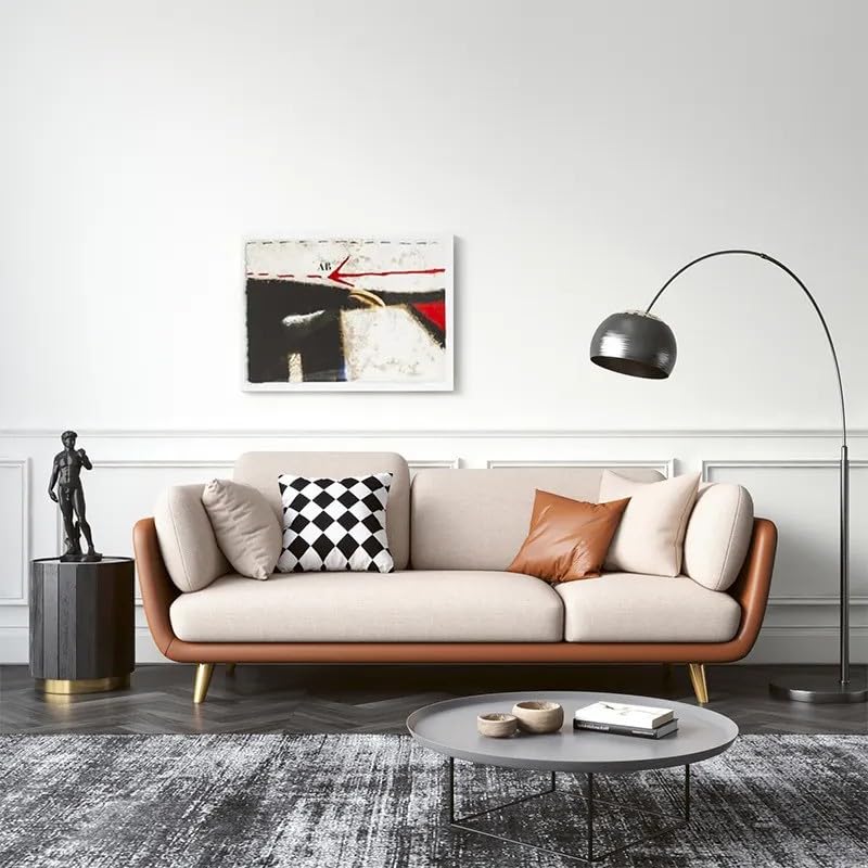 Modern living room with a beige sofa, decorative pillows, and a floor lamp.