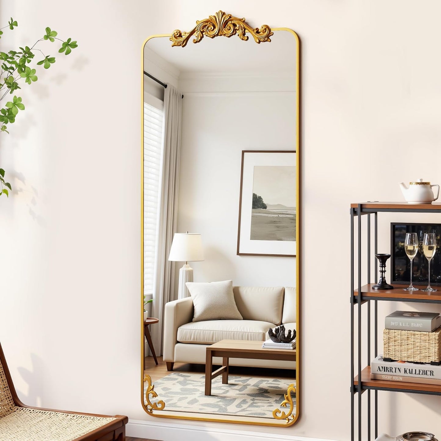 Decorative full-length mirror with gold frame in a living room setting