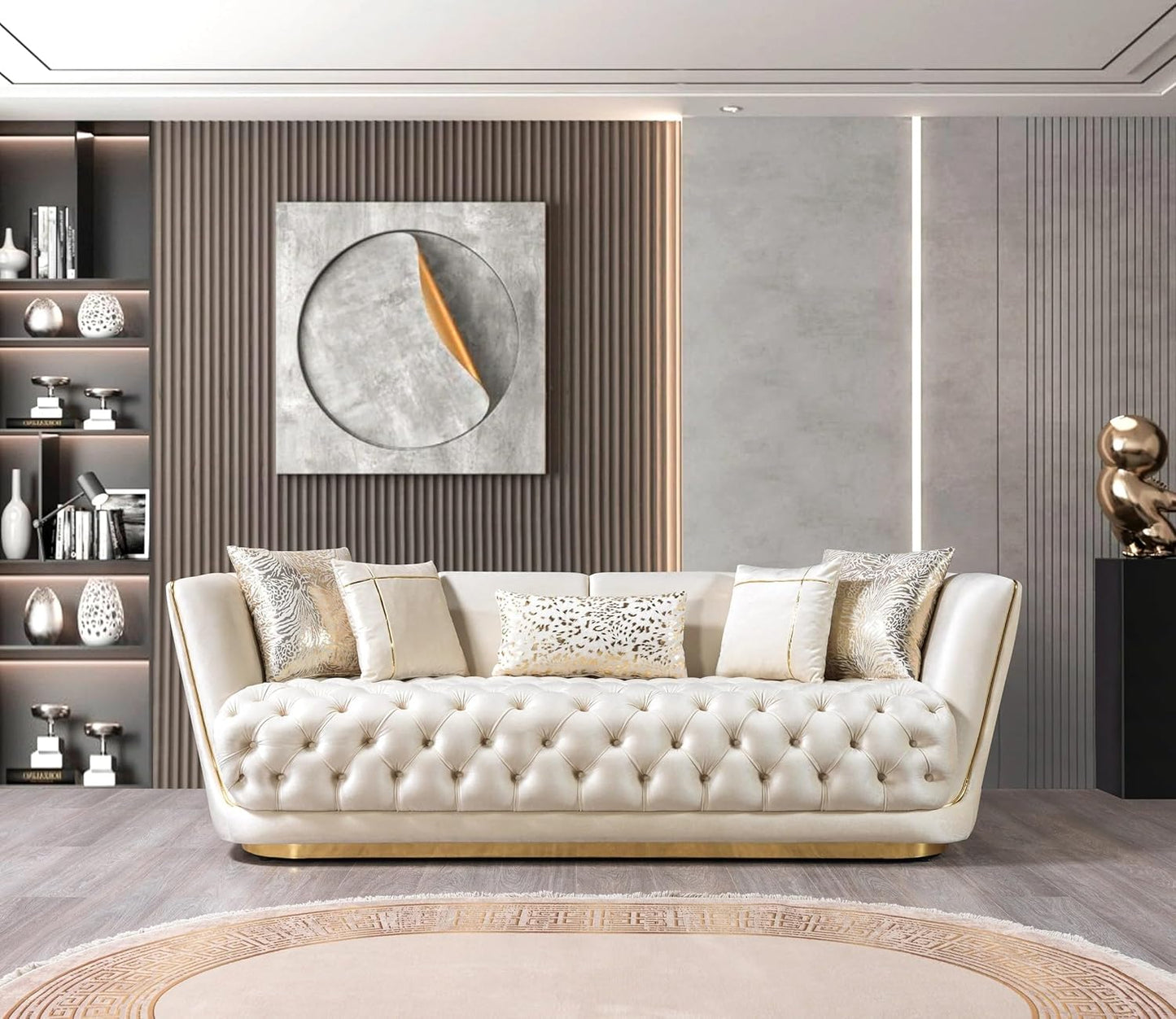Modern living room with a cream-colored sofa, decorative pillows, and a stylish wall mirror.
