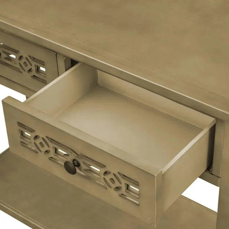 Beige desk with an open drawer featuring decorative patterns.