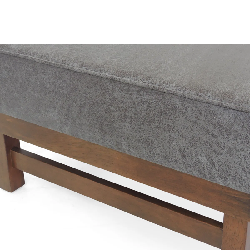 Gray cushioned bench with wooden frame on a white background