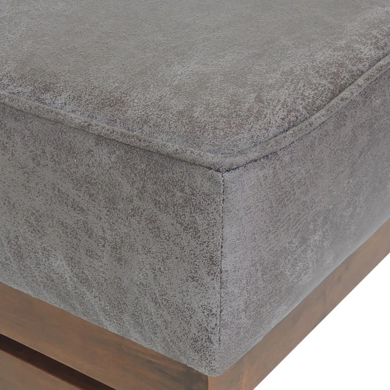 Gray textured ottoman corner on a white background