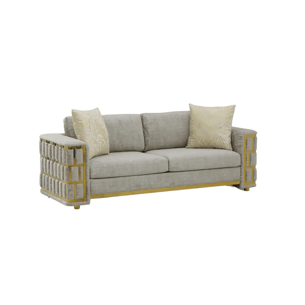 Gray sofa with gold frame and decorative pillows on a white background