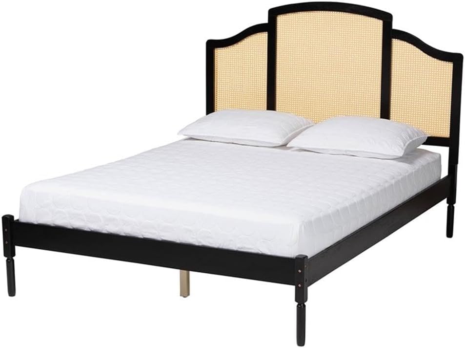 Bed with black frame and beige headboard on a white background