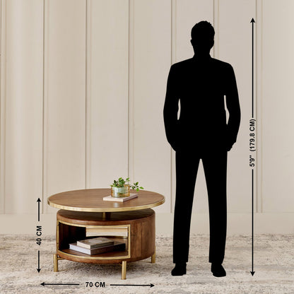 Wooden round coffee table with dimensions shown next to a silhouette of a person.