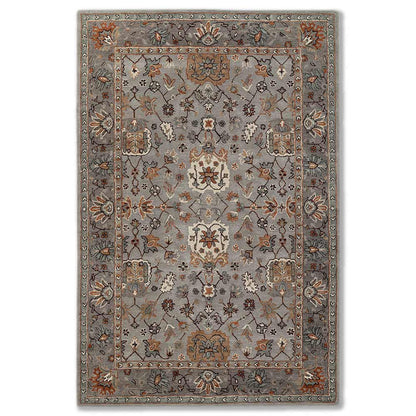 Decorative rug with floral patterns on a plain background