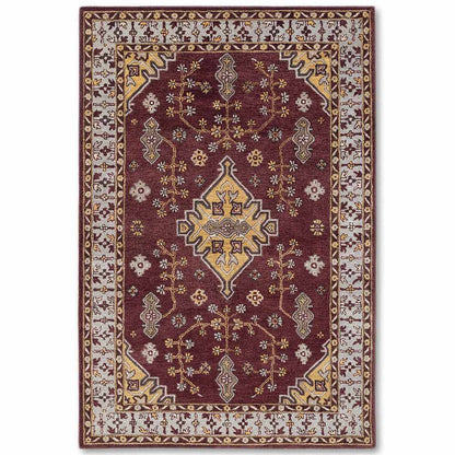 Decorative rug with intricate patterns on a white background