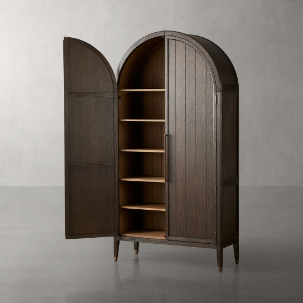 Wooden armoire with open doors on a gray background