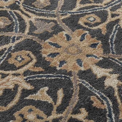 Close-up of a patterned rug with intricate designs.