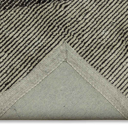 Close-up of a textured rug with geometric pattern