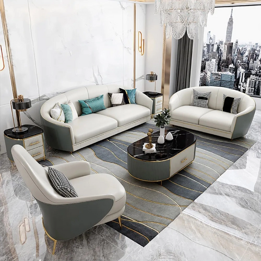 Modern living room with white sofa, armchair, and coffee table in a stylish interior.