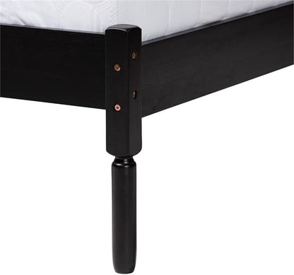 Black metal bed frame with visible screws on a white background