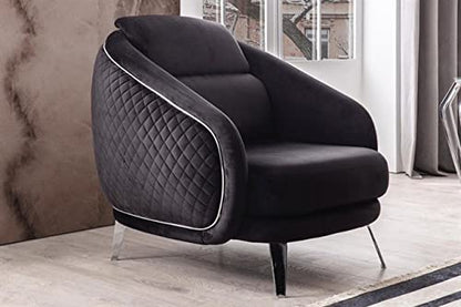 Black armchair with quilted details in a room setting