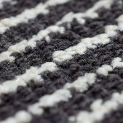 Close-up of a textured black and white patterned fabric