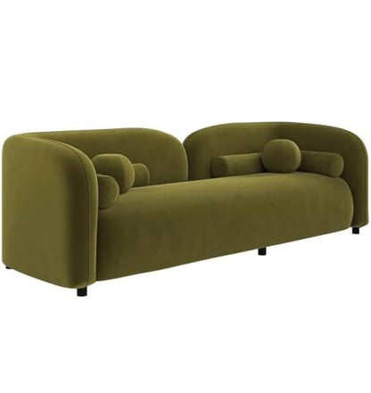 Green sofa with curved design on a white background