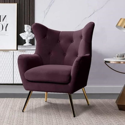 Purple armchair in a room with decorative elements