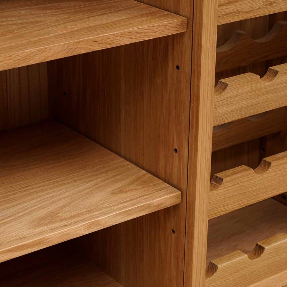 Wooden wine rack with shelves and bottles