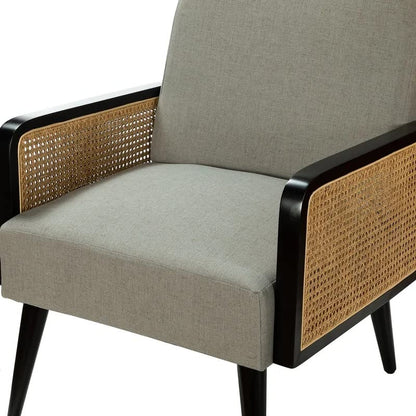 Chair with beige cushion and wicker armrests on a white background