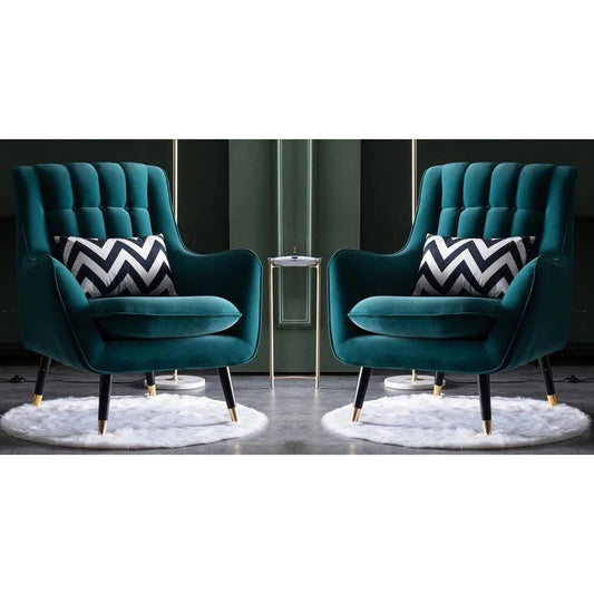 Two teal armchairs with patterned cushions on a dark floor.