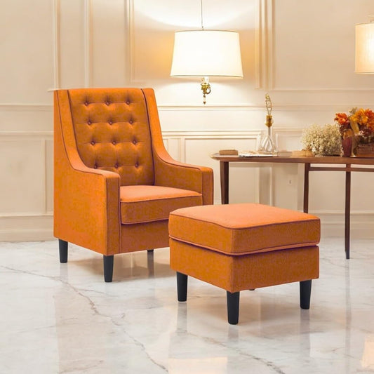 Orange armchair and ottoman in a stylish room with a lamp and table.