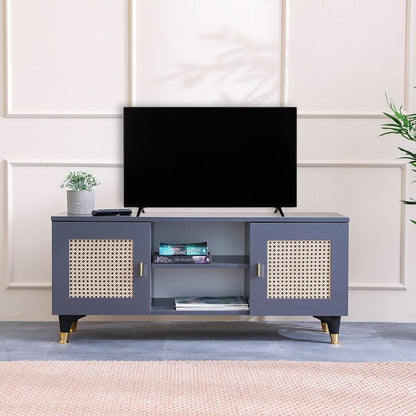 Blue TV stand with a television on top against a light-colored wall.