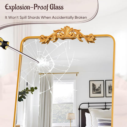 Gold-framed mirror with explosion-proof glass in a room setting