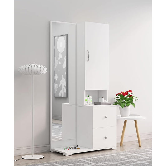 White dresser with full-length mirror in a room with a lamp and plant.