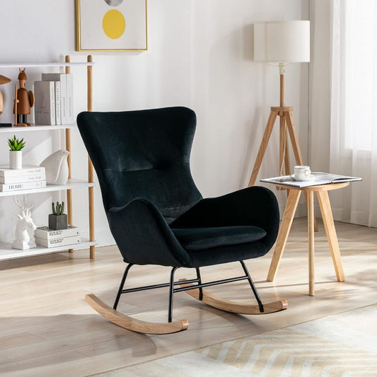 Modern black rocking chair in a stylish living room with a lamp and bookshelf.