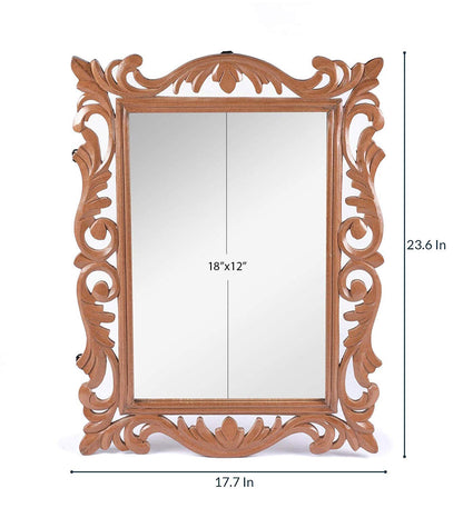 Decorative wooden mirror with intricate carvings and dimensions on a white background