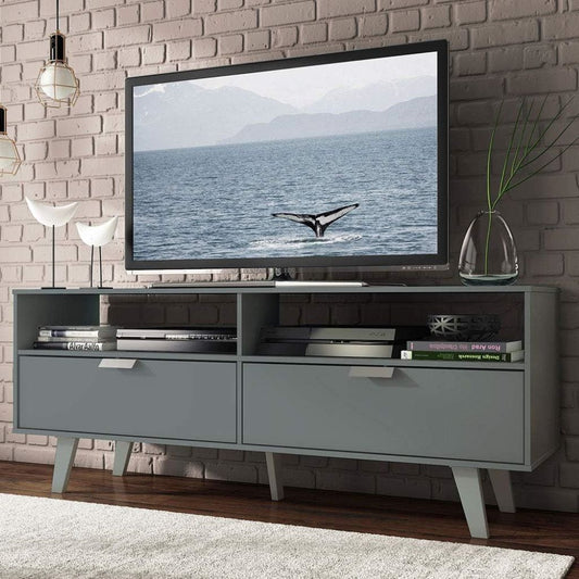 Modern TV stand with a television displaying an ocean scene, against a brick wall.