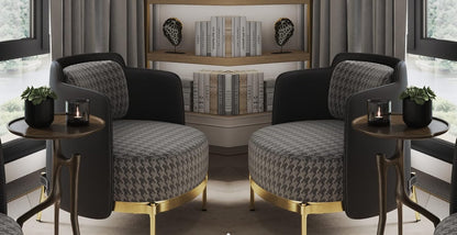 Modern living room with patterned armchairs and side tables.