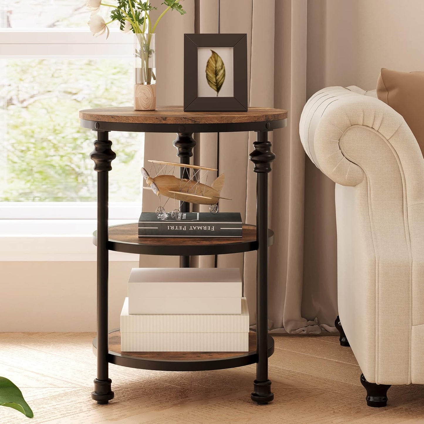 Three-tiered wooden side table with decorative items in a living room setting.
