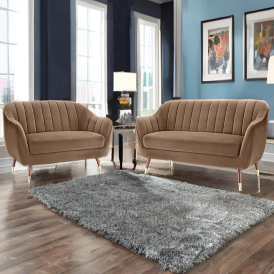 Brown sofa set in a living room with a gray rug and framed pictures on the wall.