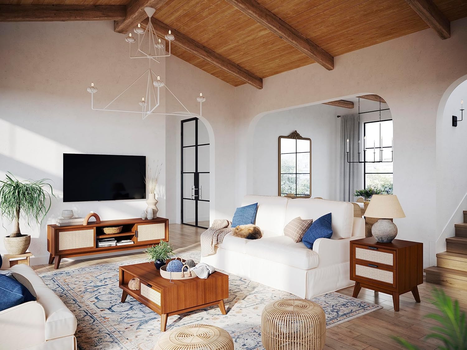 Modern living room with white sofa, wooden coffee table, and decorative elements.