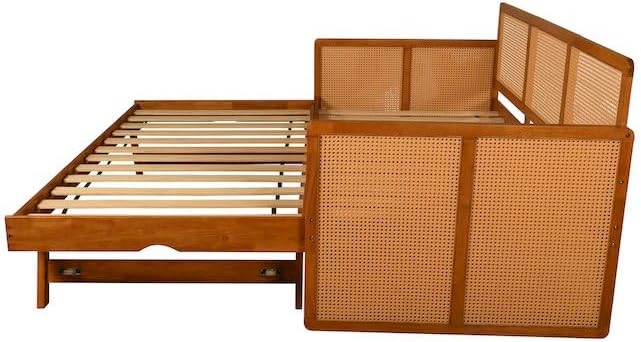 Wooden bed frame with wicker headboard and side panels on a white background