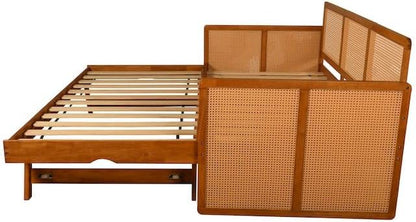 Wooden bed frame with wicker headboard and side panels on a white background
